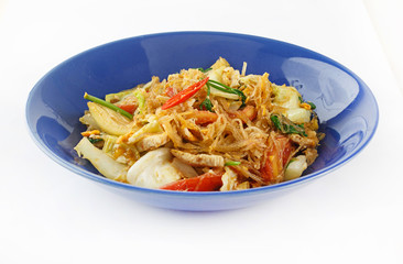 Stir fried cellophane noodles with tomato,cabbage and onion and blue dish