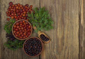 heap of red and black juniper berries background