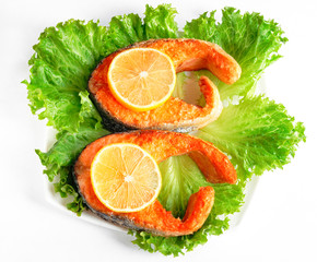 Deliciously steak of fried salmon on plate