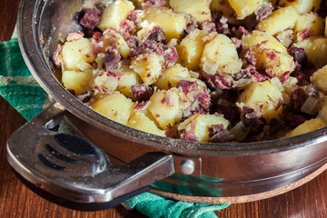 Corned beef hash in a frying pan