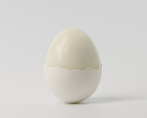 Peeled boiled egg on white background