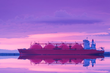 LNG TANKER - Ship at dawn moored to the gas terminal