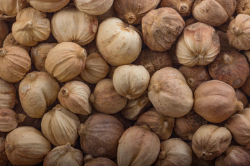 white cardamom pods background