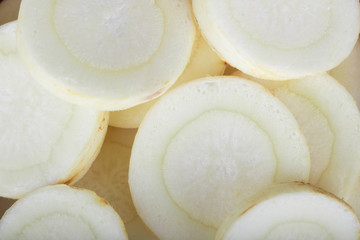 heap of slices of parsley root background