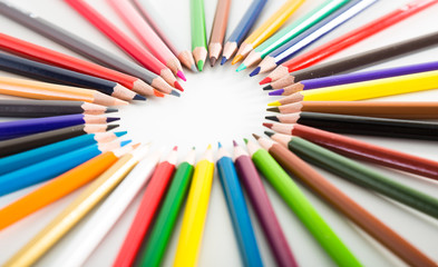 colored pencils lying around the heart
