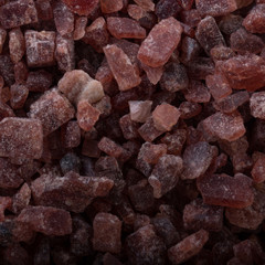 Kala namak background. black indian salt.