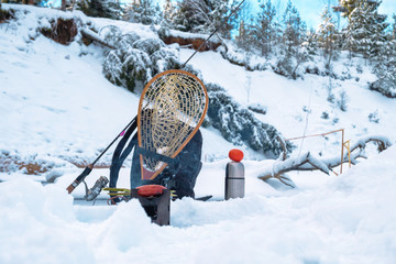 Firebox stove and grilled sausage. Picnic fishing.