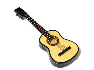 Classical acoustic guitar on white isolated background, macro