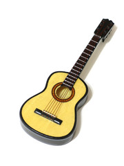 Fototapeta premium Classical acoustic guitar on white isolated background, macro