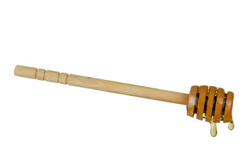 wooden spoon with honey isolated on white background