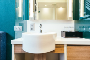White sink and faucet decoration in bathroom