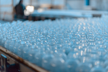 Fototapeta premium Plant for the production of bottles, glass plant