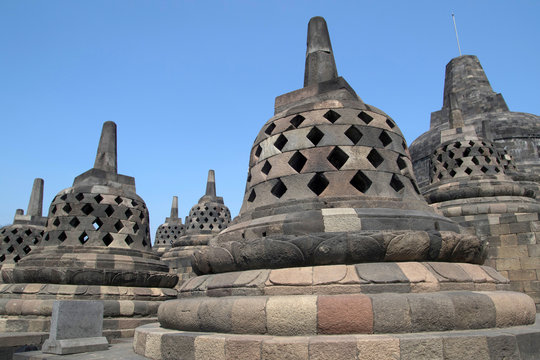 Borobudur, or Barabudur (Indonesian: Candi Borobudur, Javanese: ꦕꦤ꧀ꦣꦶꦧꦫꦧꦸꦣꦸꦂ, translit. Candhi Barabudhur) is a 9th-century Mahayana Buddhist temple in Magelang Regency, not far from the town of Munti
