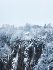 Plitvice lakes of Croatia (Hrvatska) - national park in winter  forest trees nature postcard waterfall cabin house