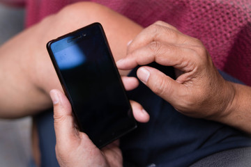 Man uses his Mobile Phone