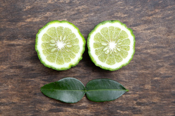 fresh bergamot with leaf on wooden background.Herb