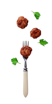 Homemade Beef Meatball On Fork Isolated On White