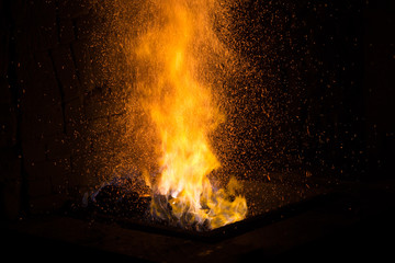 .Blacksmith forging in the traditional way, as in the past
