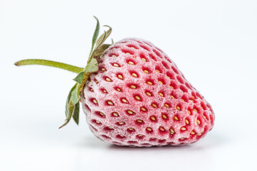 Frozen strawberry isolated on white background