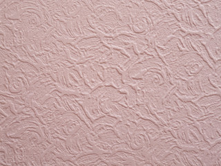 The texture of the beige material for the ceiling or wall