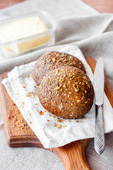 Homemade rye buns with linseeds, sesame and white poppy seeds