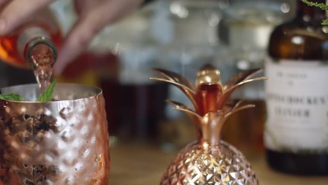 Tasty cocktail prepared at a bar by a bartender - Leckerer Cocktail der and einer Bar von einem Barkeeper zubereitet wird