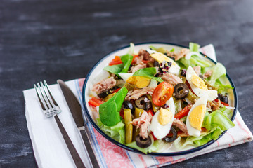 Nicoise salad with tuna, green beans, basil and fresh vegetables