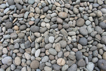Pebbles, rocks, and stones as natural decoration in the garden