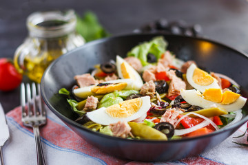 Nicoise salad with tuna, green beans, basil and fresh vegetables