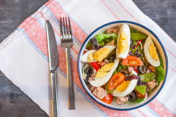 Nicoise salad with tuna, green beans, basil and fresh vegetables