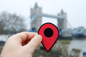 man with a red marker in Tower Bridge, London, UK