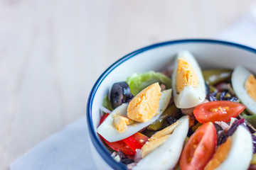 Nicoise salad with tuna, green beans, basil and fresh vegetables