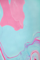 Abstract colored background. Stains of paint on the water. Ebru art, marbled paper.