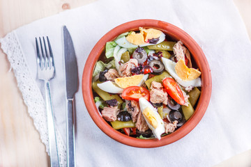 Nicoise salad with tuna, green beans, basil and fresh vegetables