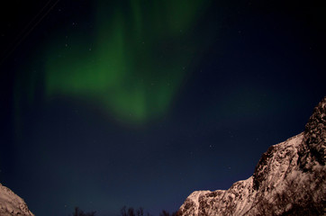 Fototapeta na wymiar Aurora Borealis, Polarlichter Nachts in Tromsø, Norwegen