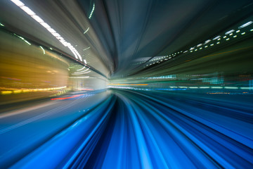 Motion blur from Yurikamome Line moving inside tunnel in Tokyo, Japan