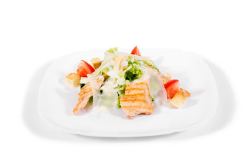 Salad on a plate on a white background