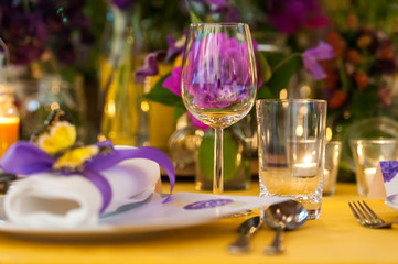 Wedding table with purple arrangement