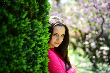 Beautiful freshness. Young lady in spring garden. Cute girl on spring nature. Pretty girl with young face skin and no makeup. Beauty model with fresh look. Skincare product and natural skin cosmetics