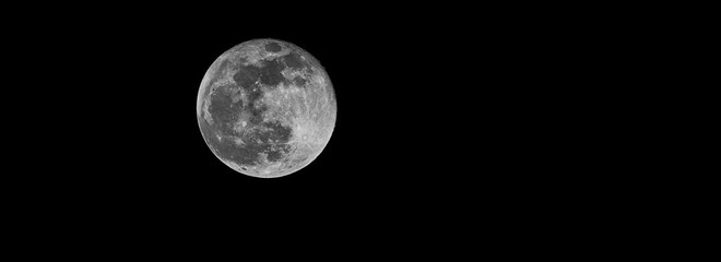 full moon web banner in black and white, picture took in Germany on January 21, 2019 in the night after the total eclipse