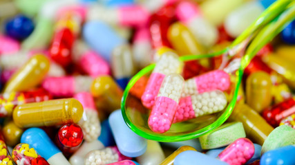 Colorful oral medication background.