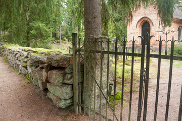 Black fence at old chapel at Wrede family cemetery. 4 September 2018 - Anjala, Kouvola, Finland.