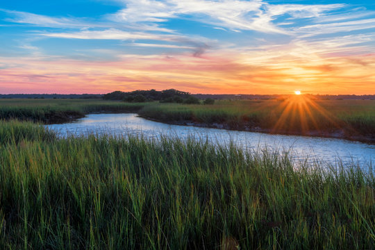 Fototapeta Sunset over a marshy branch of the Matanzas River in St. Augustine, Florida