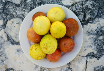 Platter of colorful ripe tropical passion fruit
