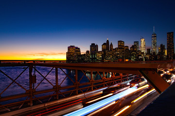 Fototapeta premium Busy traffic in New York City, Manhattan, Brooklyn Bridge