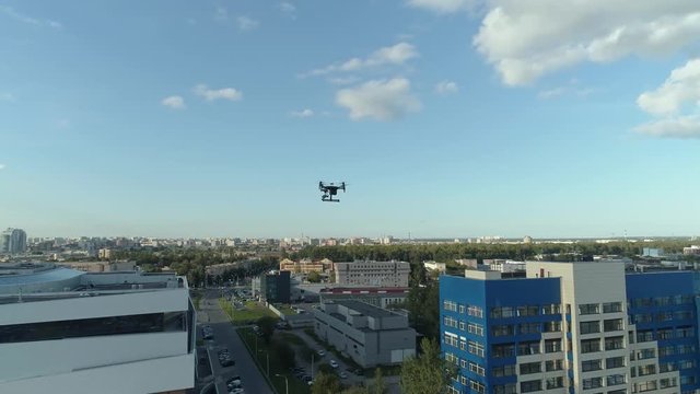 Aerial view. the bif industrial quadrocopter matrice flying over the city Saint-Petersburg, Russia. Sunny summer day.