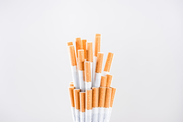 Studio shot of cigarettes with stop smoking concept isolated on grey