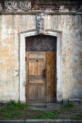 Fototapeta na wymiar old house, wall with grunge old door, texture