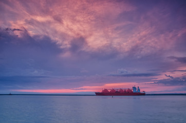 LNG TANKER - Ship at dawn moored to the gas terminal
