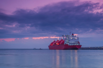 LNG TANKER - Ship at dawn moored to the gas terminal
